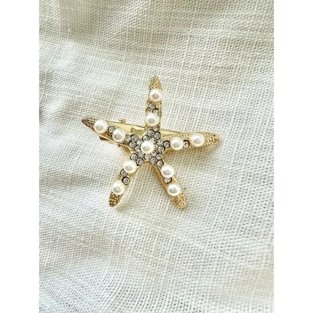 Faux pearl and rhinestone gold starfish hair clip